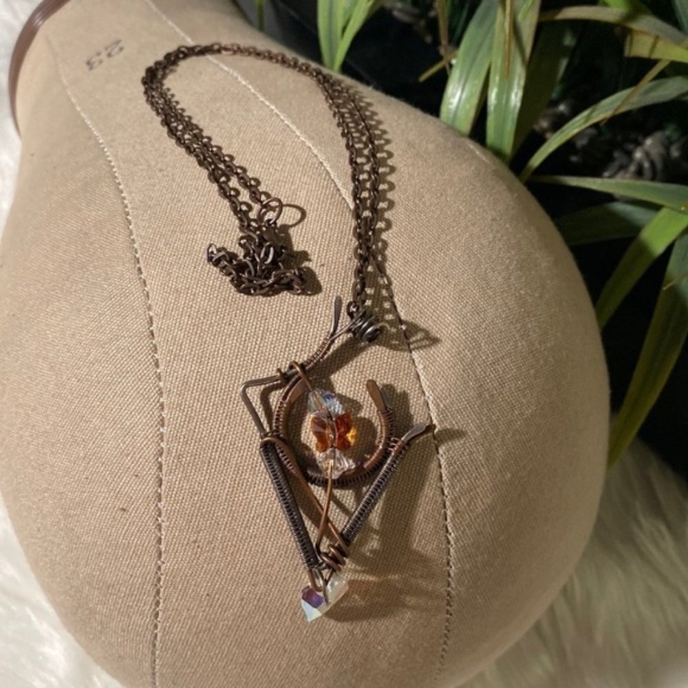 Beautiful rustic sweater necklace?
